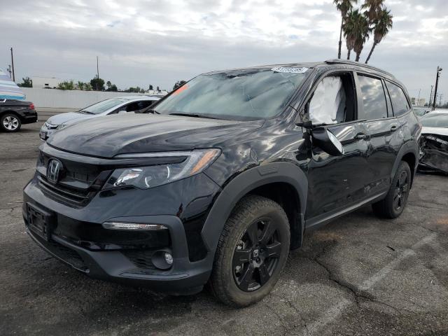 HONDA PILOT TRAI 2022 with VIN 5FNYF6H80NB055832 - Photo from auction