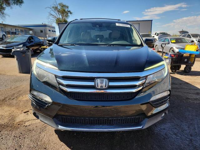 Photo 5 from auction – 2016 HONDA PILOT TOUR with VIN 5FNYF6H95GB100694