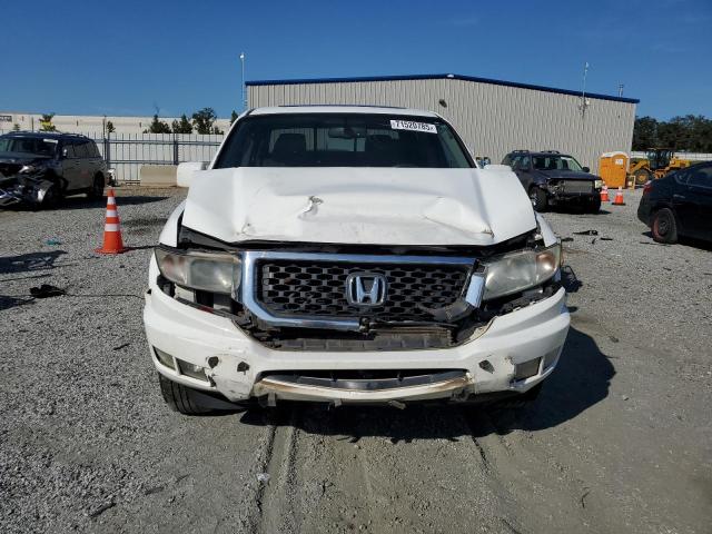 Photo 5 from auction – 2013 HONDA RIDGELINE RTL with VIN 5FPYK1F59DB011566