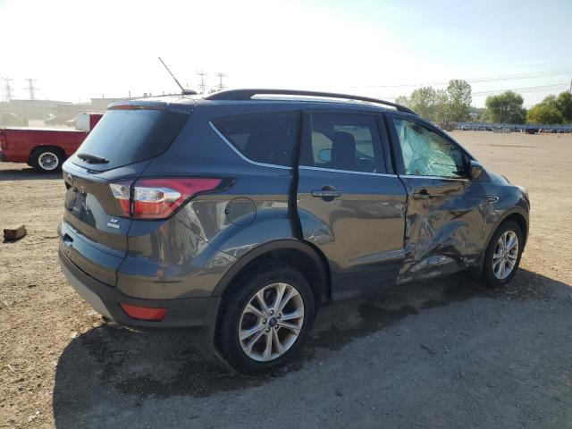 Photo 3 from auction – 2018 FORD ESCAPE SE with VIN 1FMCU0GD7JUB85471