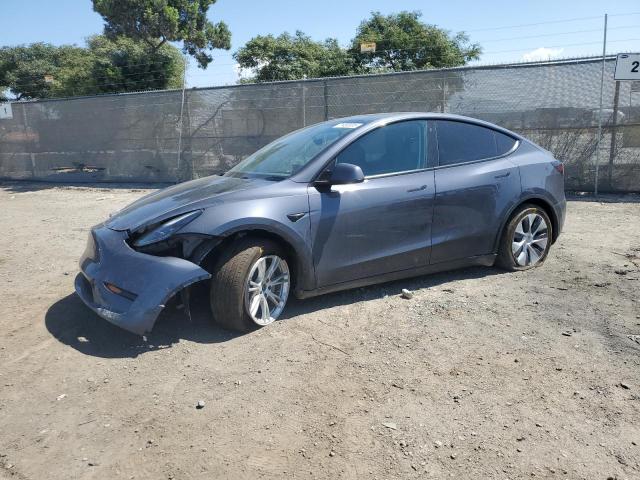 TESLA MODEL Y 2023 с VIN 7SAYGAEE8PF627164 - Фото с аукциона