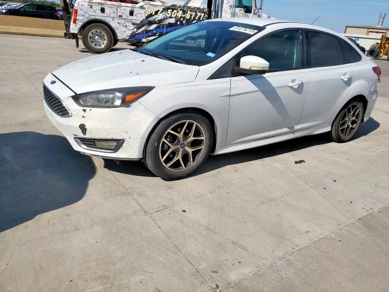 FORD FOCUS SE 2015 with VIN 1FADP3F25FL311556 - Photo from auction