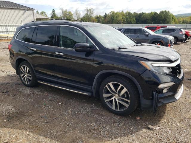 Photo 4 from auction – 2016 HONDA PILOT ELIT with VIN 5FNYF6H01GB126338