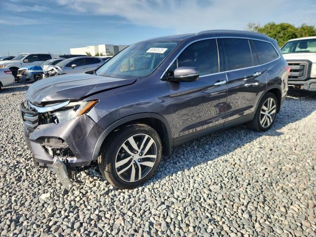 Photo 1 from auction – 2018 HONDA PILOT TOUR with VIN 5FNYF5H92JB013871