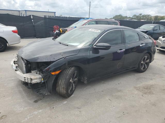 HONDA CIVIC TOUR 2018 with VIN JHMFC1F96JX019883 - Photo from auction
