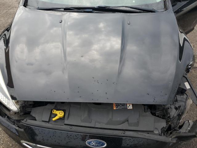 Photo 11 from auction – 2016 FORD FOCUS S with VIN 1FADP3E21GL343455
