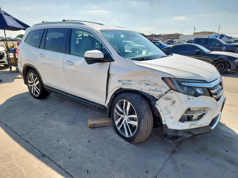 Photo 4 from auction – 2017 HONDA PILOT TOUR with VIN 5FNYF5H93HB014523