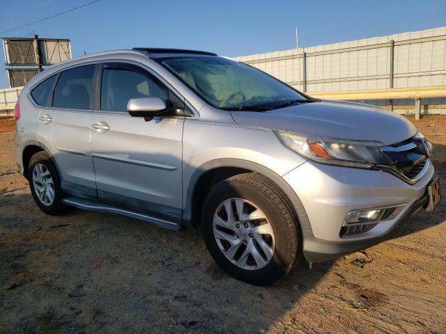 Photo 4 from auction – 2015 HONDA CR-V EXL with VIN 2HKRM4H76FH614650