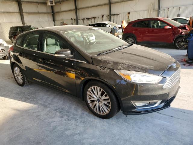 Photo 4 from auction – 2015 FORD FOCUS TITA with VIN 1FADP3N24FL305958