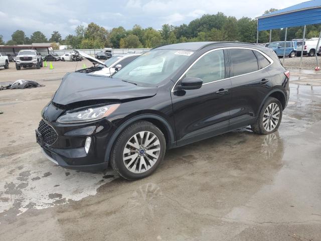 FORD ESCAPE TITANIUM 2021 with VIN 1FMCU9J97MUA71094 - Photo from auction