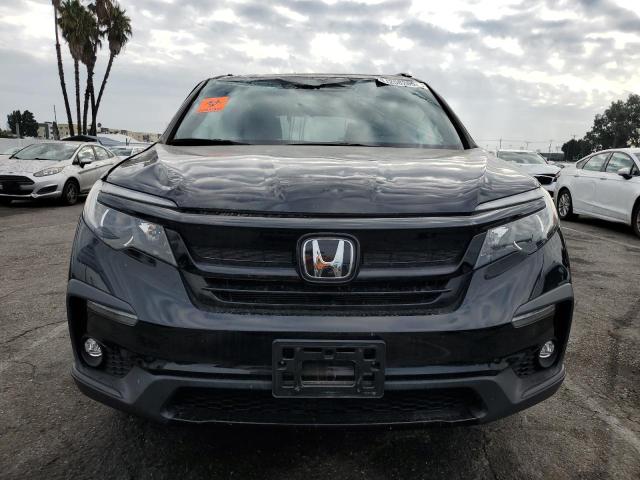 Photo 5 from auction – 2022 HONDA PILOT TRAI with VIN 5FNYF6H80NB055832