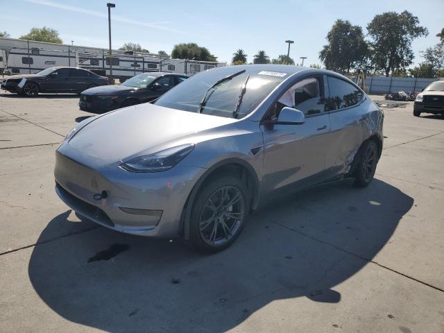 TESLA MODEL Y 2024 with VIN 7SAYGDED8RF158217 - Photo from auction