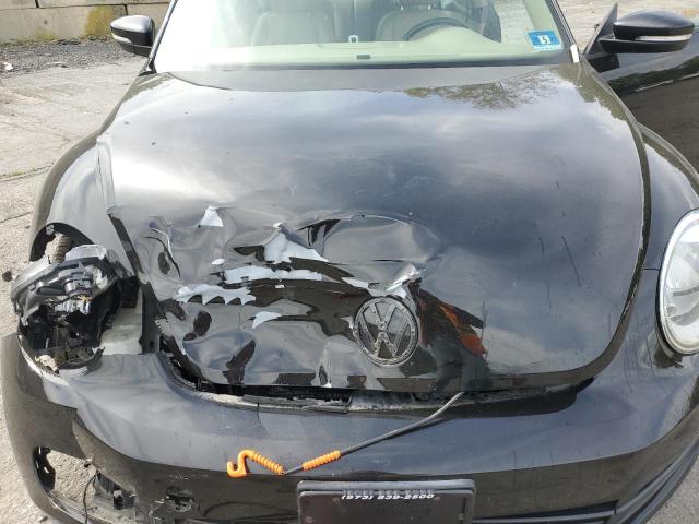 Photo 11 from auction – 2014 VOLKSWAGEN BEETLE with VIN 3VWJP7AT5EM613525