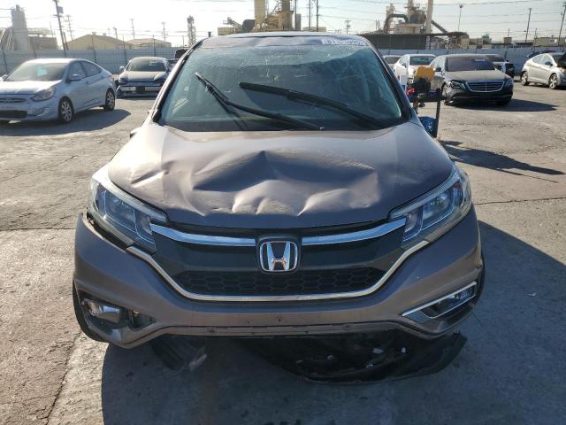 Photo 5 from auction – 2015 HONDA CR-V EX with VIN 3CZRM3H56FG703307