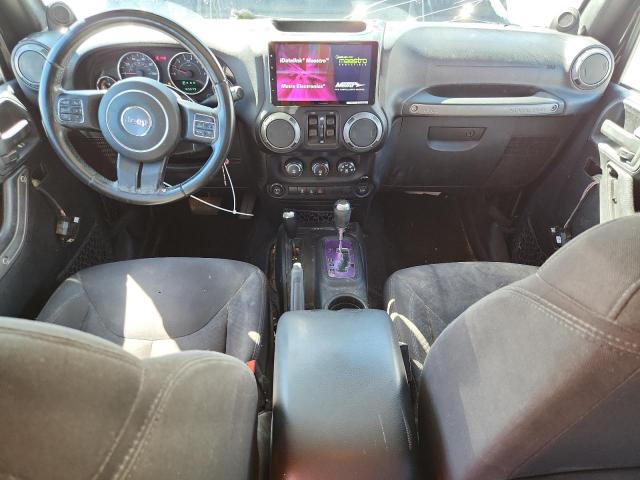 Photo 8 from auction – 2014 JEEP WRANGLER U with VIN 1C4BJWDG4EL113276
