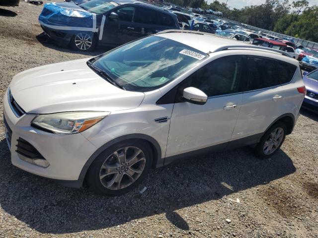 FORD ESCAPE TIT 2015 with VIN 1FMCU0JX2FUA74028 - Photo from auction