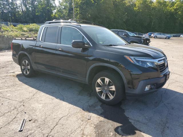 Photo 4 from auction – 2017 HONDA RIDGELINE RTL with VIN 5FPYK3F50HB037524