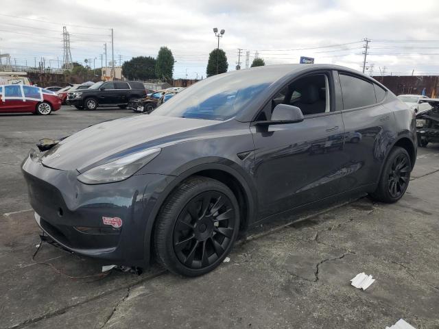 TESLA MODEL Y 2024 with VIN 7SAYGDED3RF096533 - Photo from auction