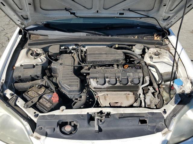 Photo 11 from auction – 2002 HONDA CIVIC LX with VIN 1HGES16582L041794