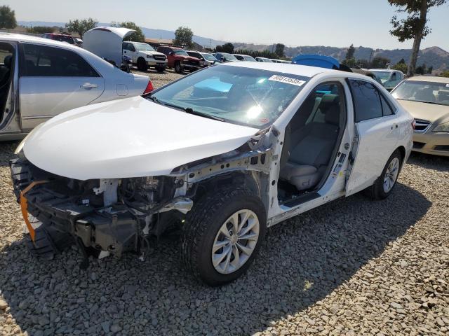 TOYOTA CAMRY HYBR 2016 with VIN 4T1BD1FKXGU186592 - Photo from auction