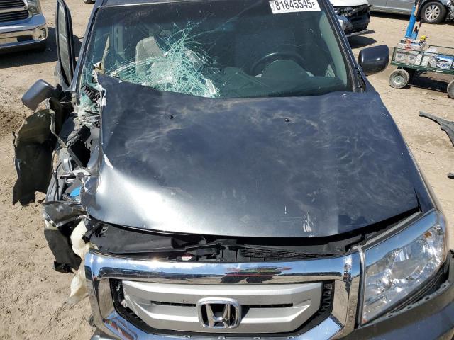 Photo 12 from auction – 2011 HONDA PILOT TOUR with VIN 5FNYF4H95BB090875