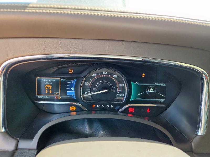 Photo 9 from auction – 2015 LINCOLN NAVIGATOR with VIN 5LMJJ2JT0FEJ06832