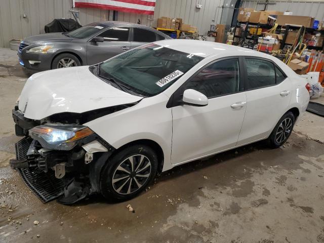 TOYOTA COROLLA L 2017 with VIN 5YFBURHE1HP570852 - Photo from auction