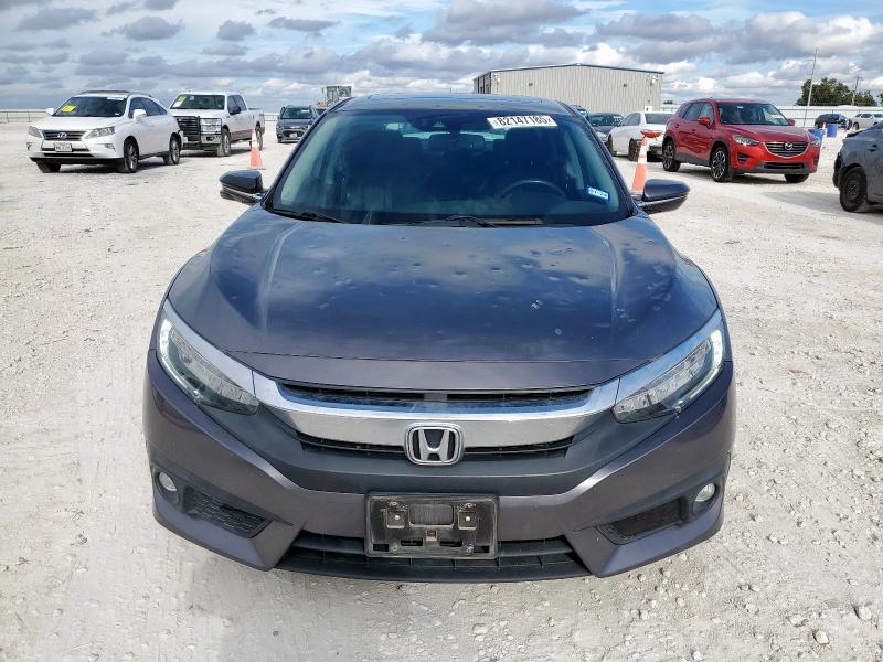 Photo 5 from auction – 2018 HONDA CIVIC TOUR with VIN JHMFC1F93JX024698