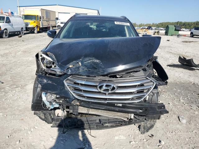 Photo 5 from auction – 2018 HYUNDAI SANTA FE S with VIN 5NMZU3LB2JH054377