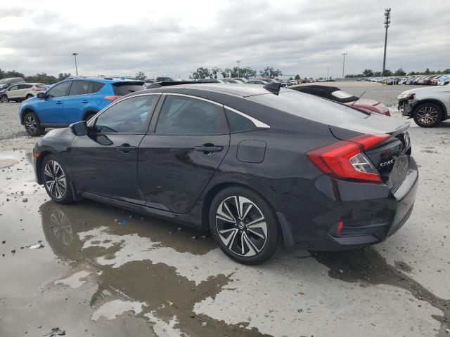 Photo 2 from auction – 2017 HONDA CIVIC EX with VIN 2HGFC1F31HH649758