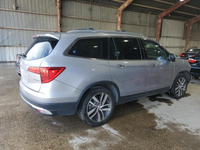 Photo 3 from auction – 2017 HONDA PILOT TOURING with VIN 5FNYF5H91HB020627