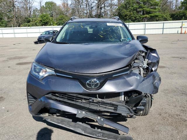 Photo 5 from auction – 2018 TOYOTA RAV4 LE with VIN JTMBFREV4JJ227848