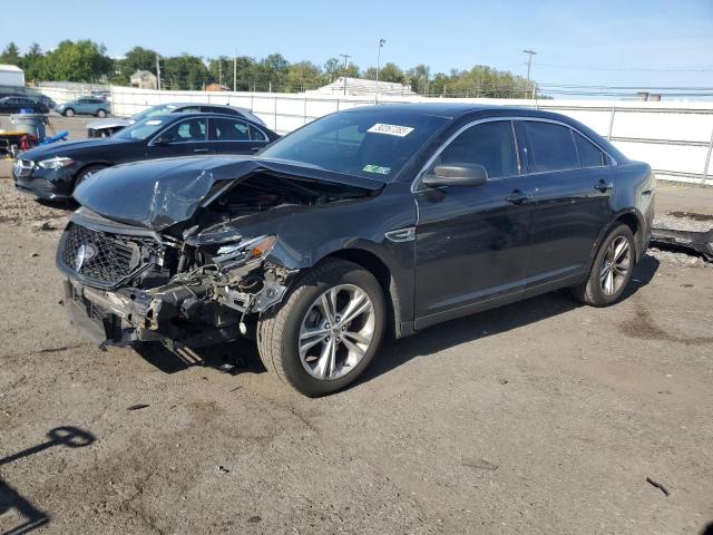 FORD TAURUS SE 2018 with VIN 1FAHP2D84JG102359 - Photo from auction