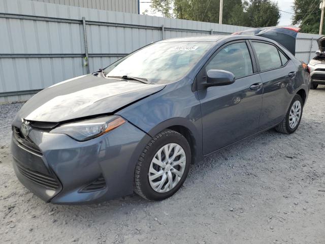 TOYOTA COROLLA L 2017 with VIN 5YFBURHE7HP713576 - Photo from auction