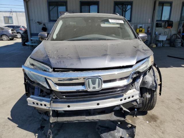 Photo 5 from auction – 2019 HONDA PILOT TOURING with VIN 5FNYF5H90KB043176