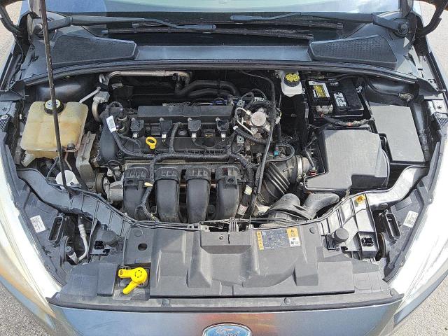 Фото 11 с аукциона – 2018 FORD FOCUS SE с VIN 1FADP3F28JL252804