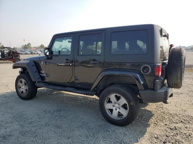 Photo 2 from auction – 2011 JEEP WRANGLER U with VIN 1J4BA5H15BL635453