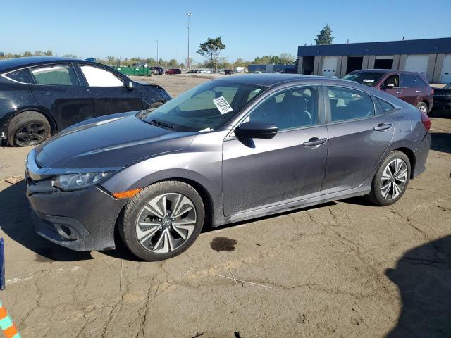 Photo 1 from auction – 2017 HONDA CIVIC EX with VIN 19XFC1F37HE018779