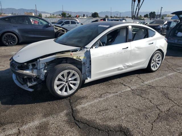 TESLA MODEL 3 2022 with VIN 5YJ3E1EB9NF154665 - Photo from auction