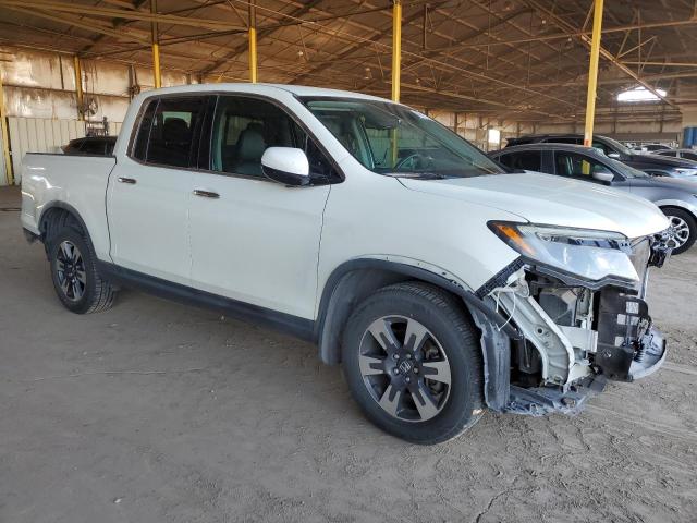 Фото 4 с аукциона – 2017 HONDA RIDGELINE с VIN 5FPYK3F74HB028522