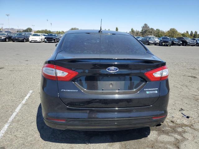 Photo 6 from auction – 2016 FORD FUSION TITANIUM PHEV with VIN 3FA6P0SU9GR316342