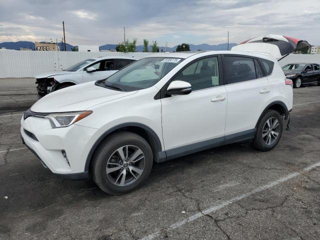 TOYOTA RAV4 XLE 2017 with VIN JTMWFREVXHJ148969 - Photo from auction