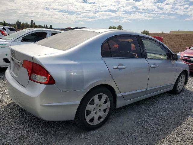 Photo 3 from auction – 2011 HONDA CIVIC LX with VIN 2HGFA1F53BH517275