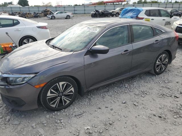 HONDA CIVIC EX 2017 with VIN 19XFC1F30HE028599 - Photo from auction
