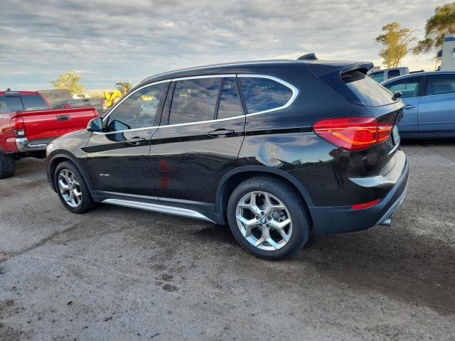 Photo 2 from auction – 2016 BMW X1 XDRIVE2 with VIN WBXHT3C32GP886943