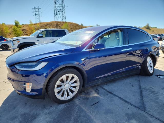 TESLA MODEL X 2018 with VIN 5YJXCBE28JF115377 - Photo from auction