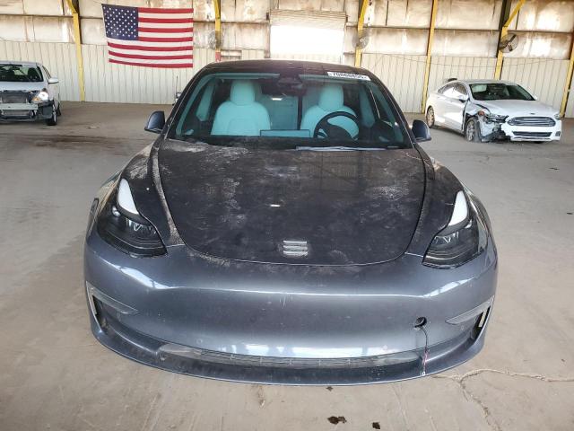 Photo 5 from auction – 2022 TESLA MODEL 3 with VIN 5YJ3E1ECXNF295804