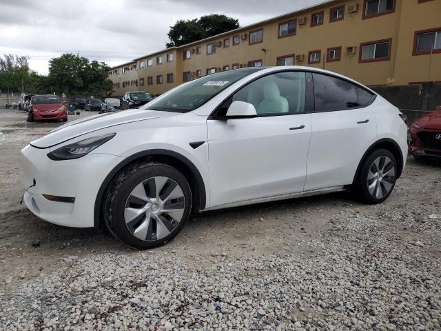 TESLA MODEL Y 2022 with VIN 7SAYGDEE7NF445745 - Photo from auction