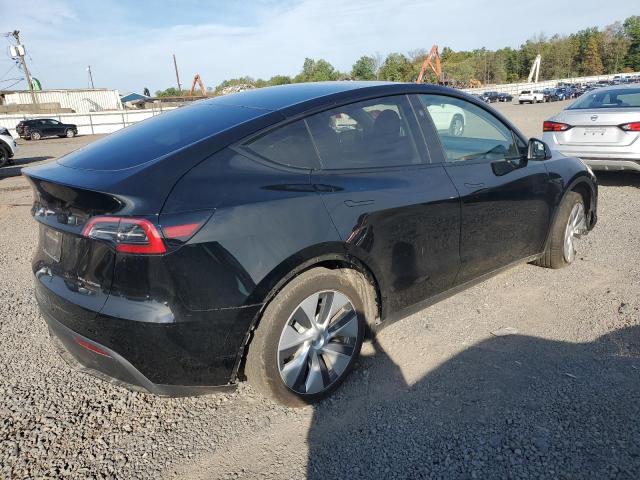 Photo 3 from auction – 2023 TESLA MODEL Y with VIN 7SAYGAEE5PF930399