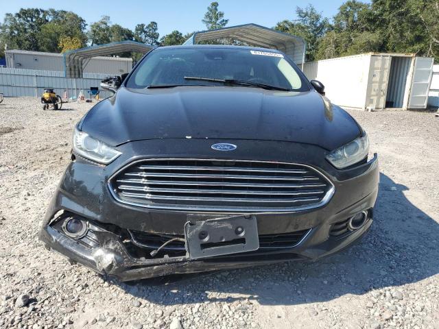 Photo 5 from auction – 2014 FORD FUSION TIT with VIN 3FA6P0D99ER197620
